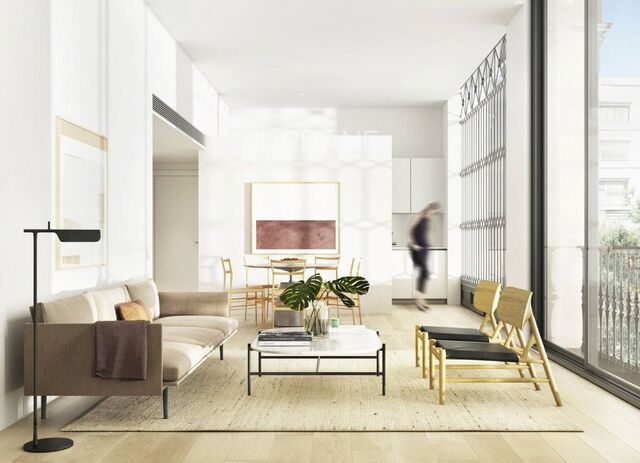 Moderno Apartamento en Eixample: Estilo, Amplitud y Conveniencia.